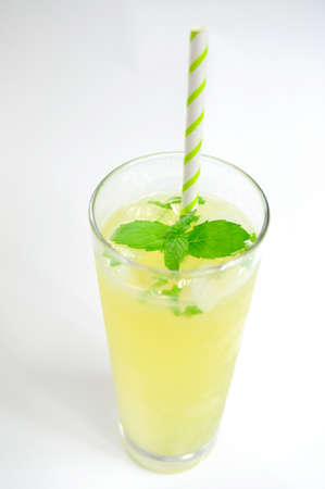 Fresh lemonade in glass with mint leafの写真素材