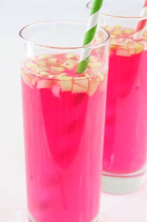 Pink sauerkraut juice in glassesの写真素材
