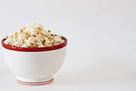 Bowl of tasty popcorn with type spaceの写真素材