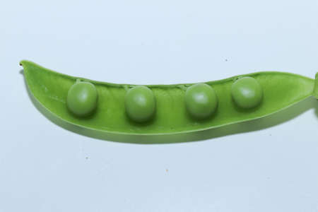 Pea pods isolated on a white background. green peas. healthy eating. green plantの写真素材