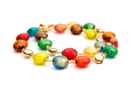 Necklace made of colorful beads isolated on whiteの写真素材
