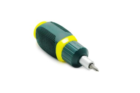 green screwdriver with yellow parts isolated over white backgroundの写真素材