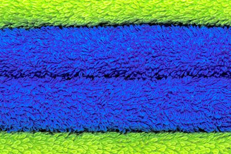 pile of green and blue towels close up の写真素材