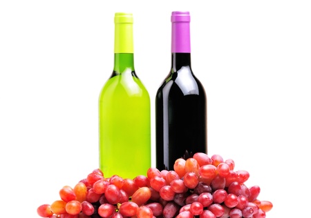 two bottles of wine and the red grape isolated over white