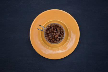 cup with coffee beans - plate topの写真素材