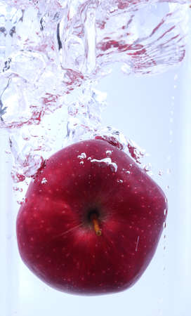 Apple in waterの写真素材