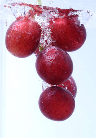 Grapes in waterの写真素材