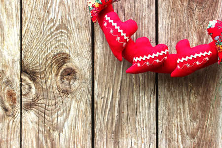 Red hearts on a wooden backgroundの写真素材