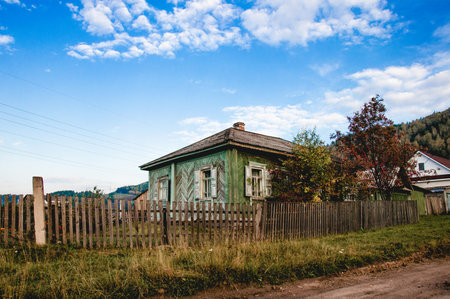 Small cottage house in the village, residential building real estate landscape