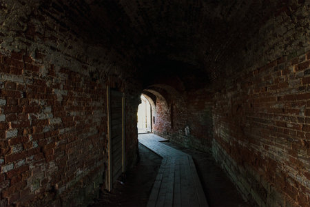 Corridor inside an old stone fortress, fortification, heritage landmark of the cityの写真素材