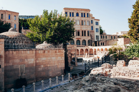 Historic architecture and ancient ruins in a sunny urban settingの写真素材
