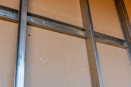 Installation of gypsum wall renovation of apartment plasterboard and metal beam