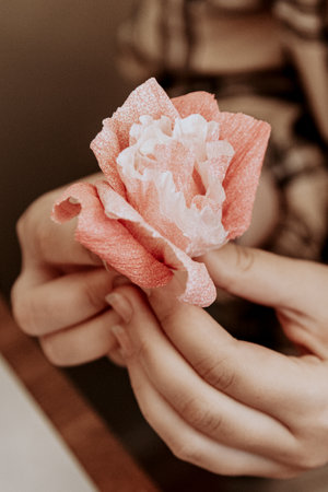 Making a craft from colored paper in an educational settingの写真素材