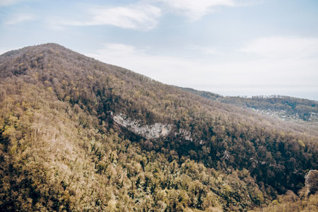 Landscape of Sochi mountains, mountain range in haze in summerの写真素材