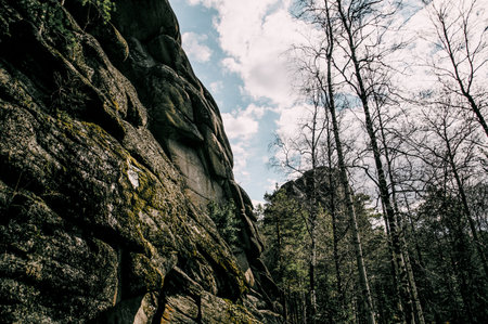 Landscape of Siberia mountains Stolbi, rock peak range in haze in summerの写真素材