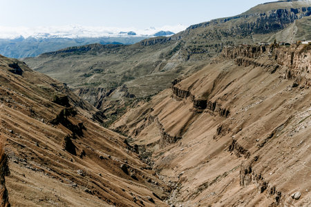 Landscape of Dagestan mountains, mountain range in haze in summer Russiaの写真素材
