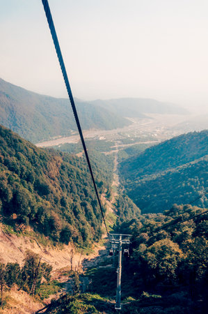 Ski resort in Tufandag, Tfan, Azerbaijan, view of the ski track with cable car in summer