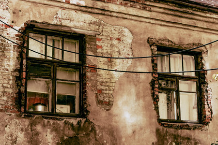 Glazed window, the exterior of residential cobblestone country suburb house building