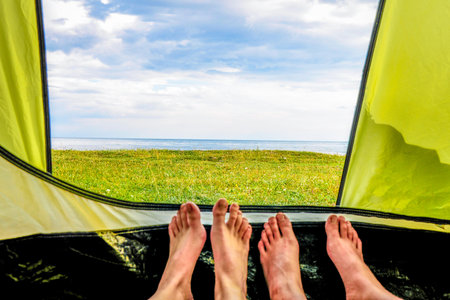 Nature view from tent, camping outdoor vacation adventure travelの写真素材