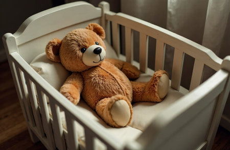 AI Generative Teddy bear lying in crib, stuffed toy in children's bedroomの素材