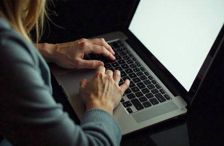 AI Generative Woman Worker Work on Laptop at Desk in Office, remote work on notebookの素材
