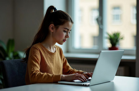 AI Generative Woman Worker Work on Laptop at Desk in Office, remote work on notebookの素材