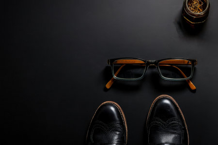 AI Generative Flat Lay on Black Background with Men's Accessories, Clothes and shoes copy spaceの素材