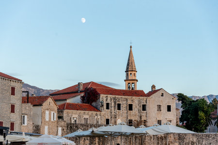 View from the Adriatic Sea to the Old Town of Budva Fortress bastion tower, Montenegroの写真素材
