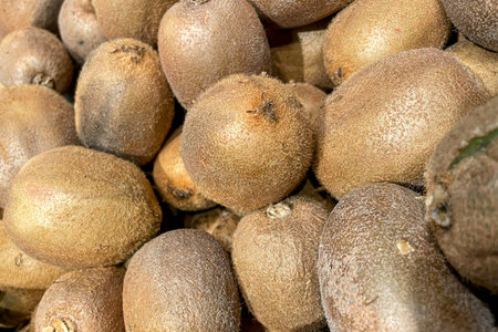Kiwi in basket at the grocery store, fruits and vegetables are sold at the marketの写真素材