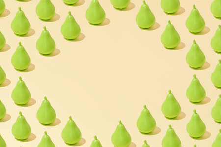 Creative abstract summer pear pattern flat lay on pastel yellow background minimalism with copy...