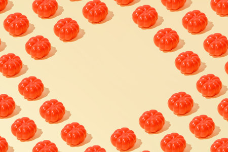 Creative summer abstract tomato pattern flat lay on pastel yellow background minimalism with copy...