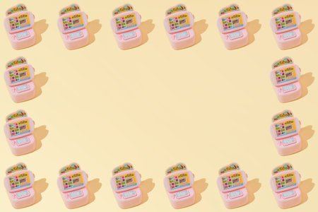 Creative abstract pattern flat lay on pastel yellow background minimalism with copy spaceの写真素材