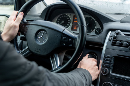 Bar, Montenegro, 9 January 2026, Man driver holding the steering wheel of Mercedes carのeditorial素材