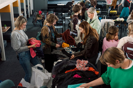 Bar, Montenegro, 8 March 2026, Swap second hand meet for resale, reuse and exchange of clothes and shoes, concept of conscious consumption, decluttering and underconsumption coreのeditorial素材