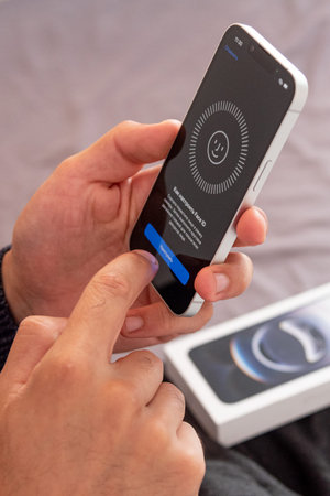 Bar, Montenegro, 2 November 2025, Setting up face ID on new iPhone Apple smartphone