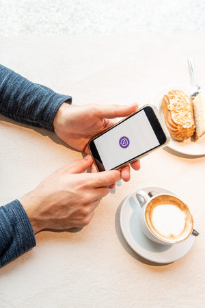 Bar, Montenegro, 9 January 2026, Man calls or writes message through modern Viber mobile messenger...