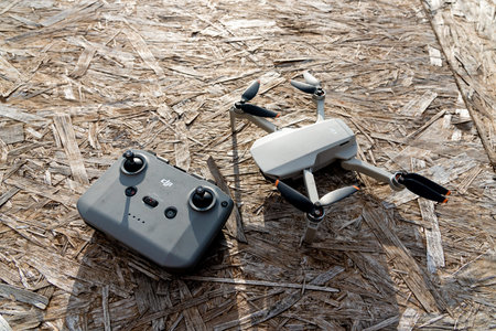 Bar, Montenegro, 2 November 2025, Drone UAV model DJI Mavic Mini and remote controller top view,...