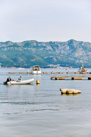 Budva, Montenegro, 13 May 2024, Tourist boats parked in port on the Adriatic Sea
