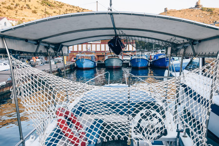 Balaklava, Crimea, 21 July 2020, Boats in the port of seaside city on the Black Sea