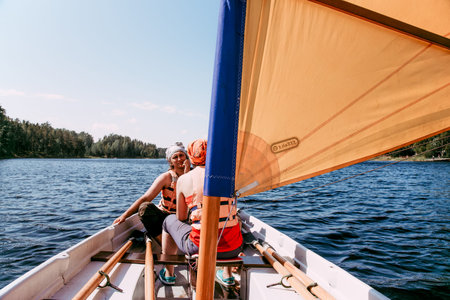 Karelia, Russia, 9 June 2019, Tourists sail on wooden sailboat skiffs on Lake Ladoga