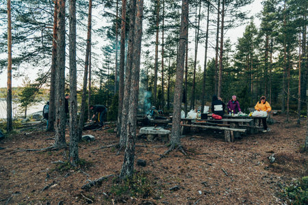 Karelia, Russia, 23 May 2020, Tourist tent parking, travelers have lunch in the open air, hiking...