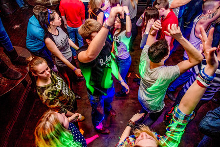 Sheregesh, Russia, 21 February 2017, Night party in club, people dancing on background of bright...