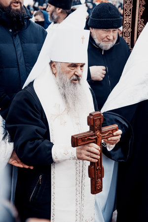 Saint Petersburg, Russia, 19 January 2022, Priest consecrating river water for baptism, holy father...