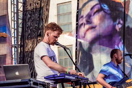 Saint Petersburg, Russia, 12 June 2019, Man pianist vocalist sing, musician singer performs at...