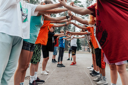 Saint Petersburg, Russia, 23 July 2020, Kids teens playing sport active game outdoor