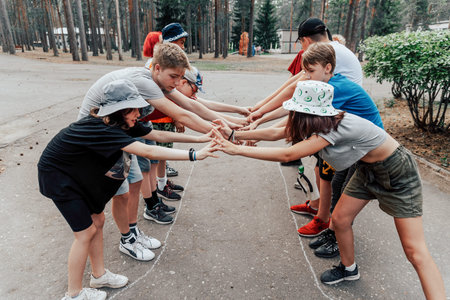 Saint Petersburg, Russia, 23 July 2020, Kids teens playing sport active game outdoor