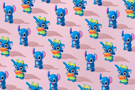 Bar, Montenegro, 1 December 2025, Stitch Toy Creative Pattern flat lay on pastel pink background minimalismのeditorial素材