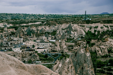 Cappadocia, Turkey, 11 May 2018, Buildings of the city of Goreme, carved into the rocks of the...