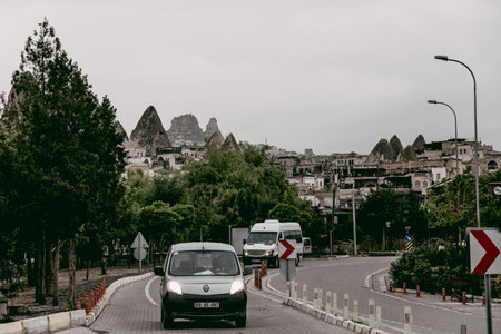 Cappadocia, Turkey, 12 May 2018, Buildings of the city of Goreme, carved into the rocks of the...
