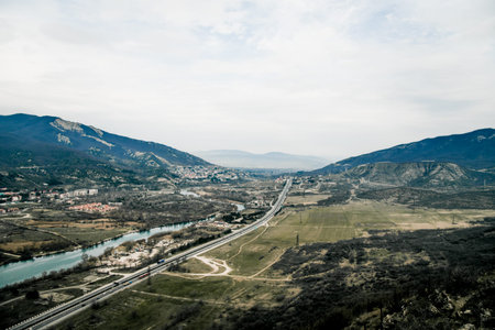 Mtskheta, Georgia, 13 March 2019, Panorama view of the city, buildings and mountains in the...
